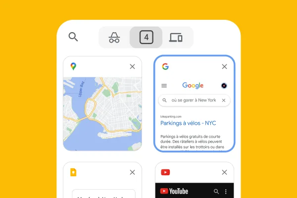 Un navigateur mobile charge les onglets du navigateur d'un ordinateur de bureau, y compris Google Maps et les informations de stationnement à New York.